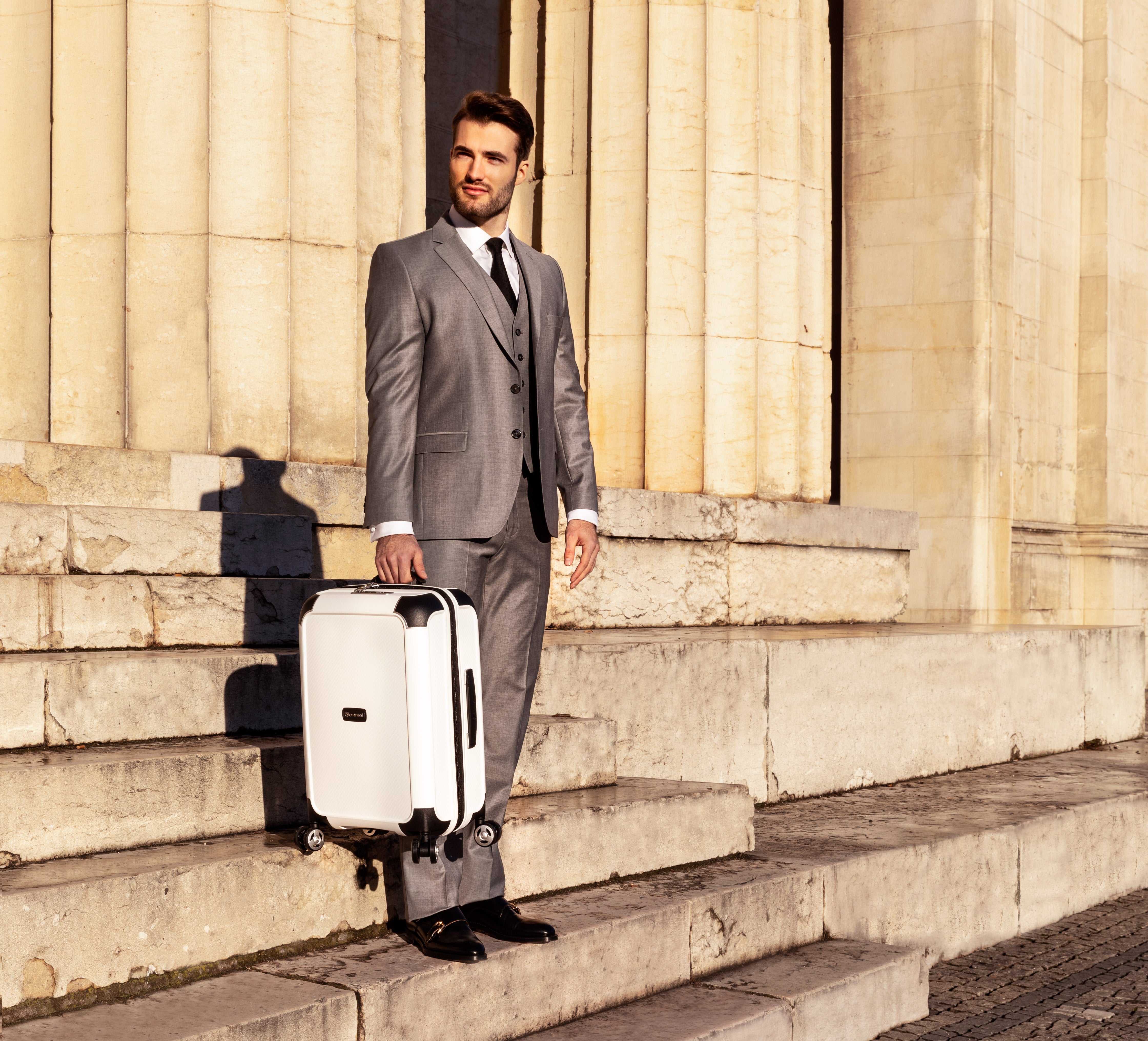 man with eminent suitcase